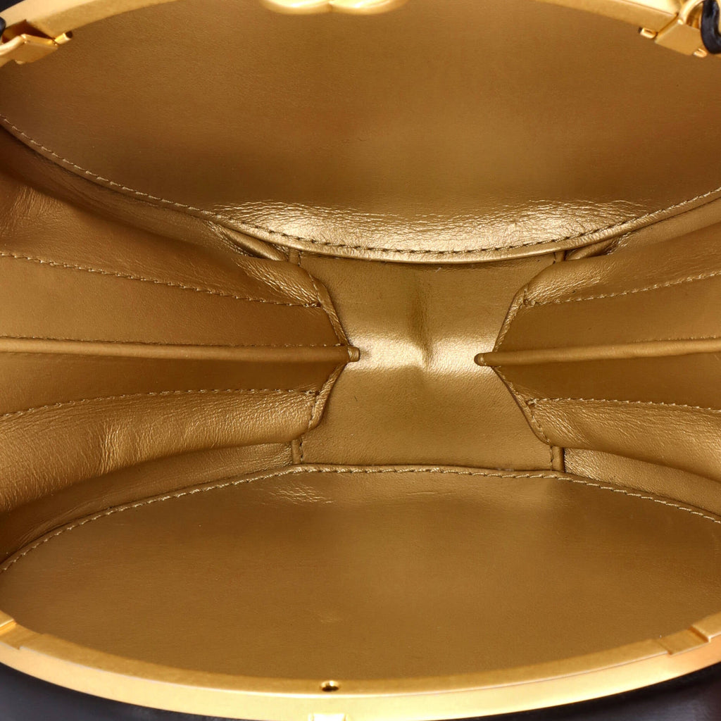 Oval Frame Clutch on Chain Quilted Lambskin